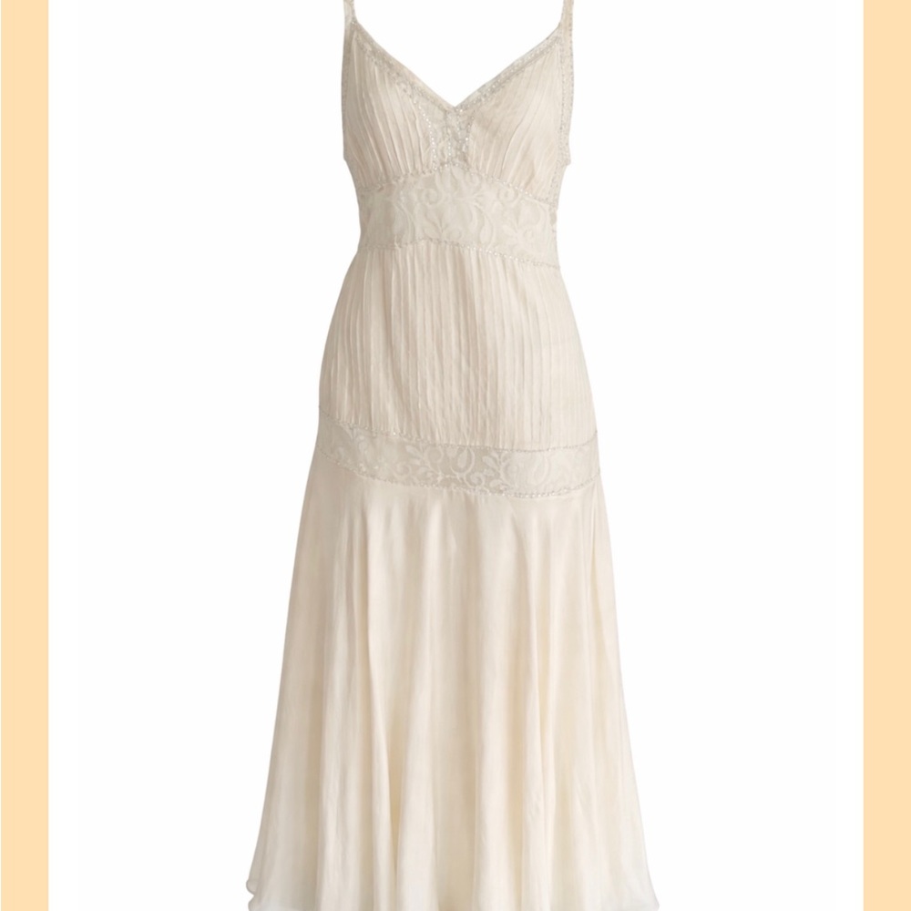 Aghy Bell’s St. Barth Off-White Beaded Dress originally purchased from YOOX.